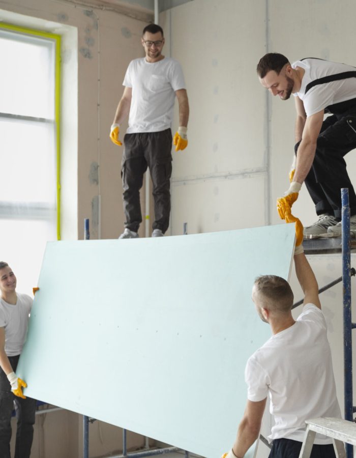 medium-shot-people-carrying-placard-together